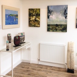 Paintings by Andrew Tozer (left) and Jon Doran (right) with ceramic sculpture by Peter Hayes